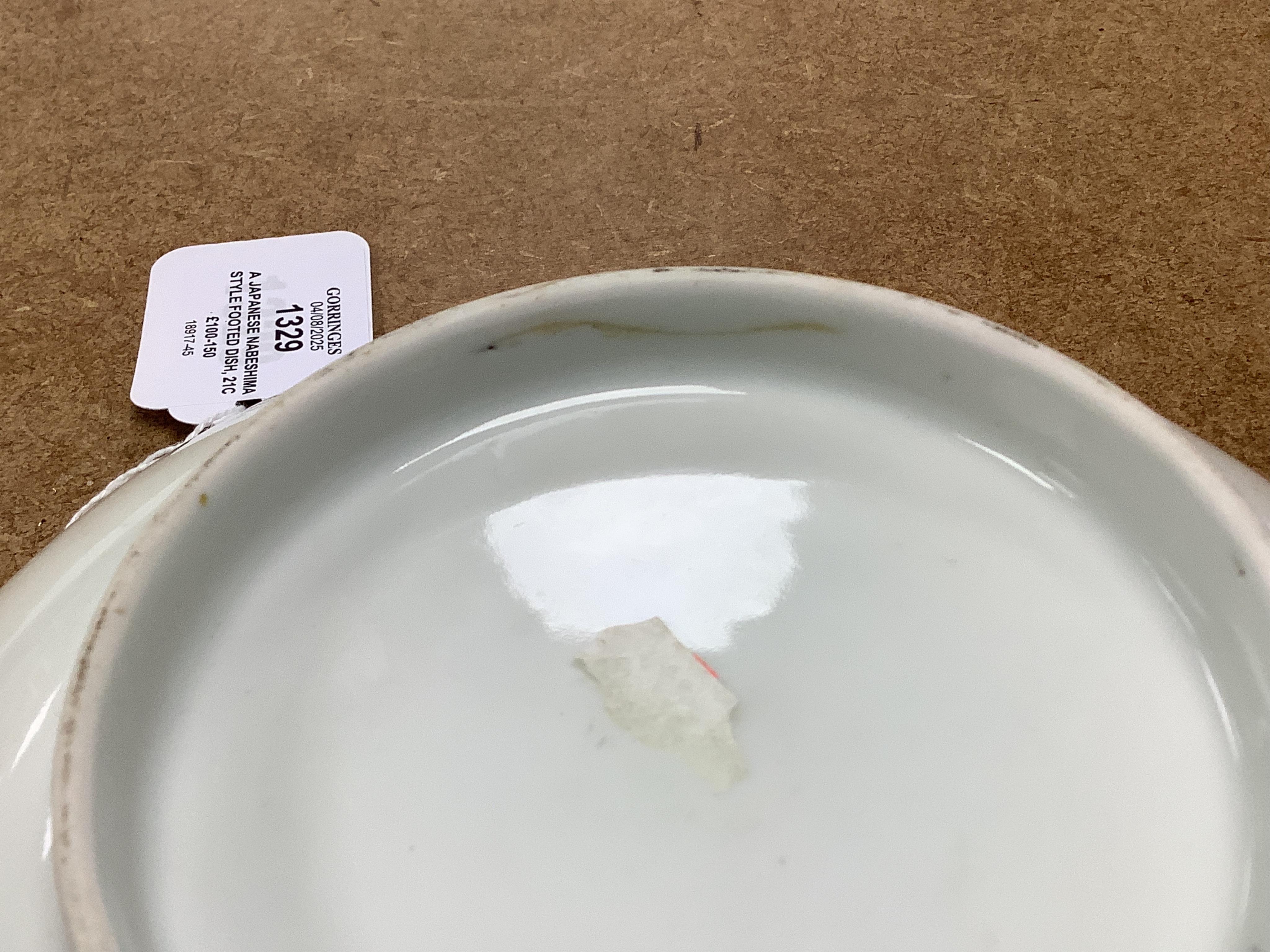 A Japanese Nabeshima style footed dish, 21cm diameter